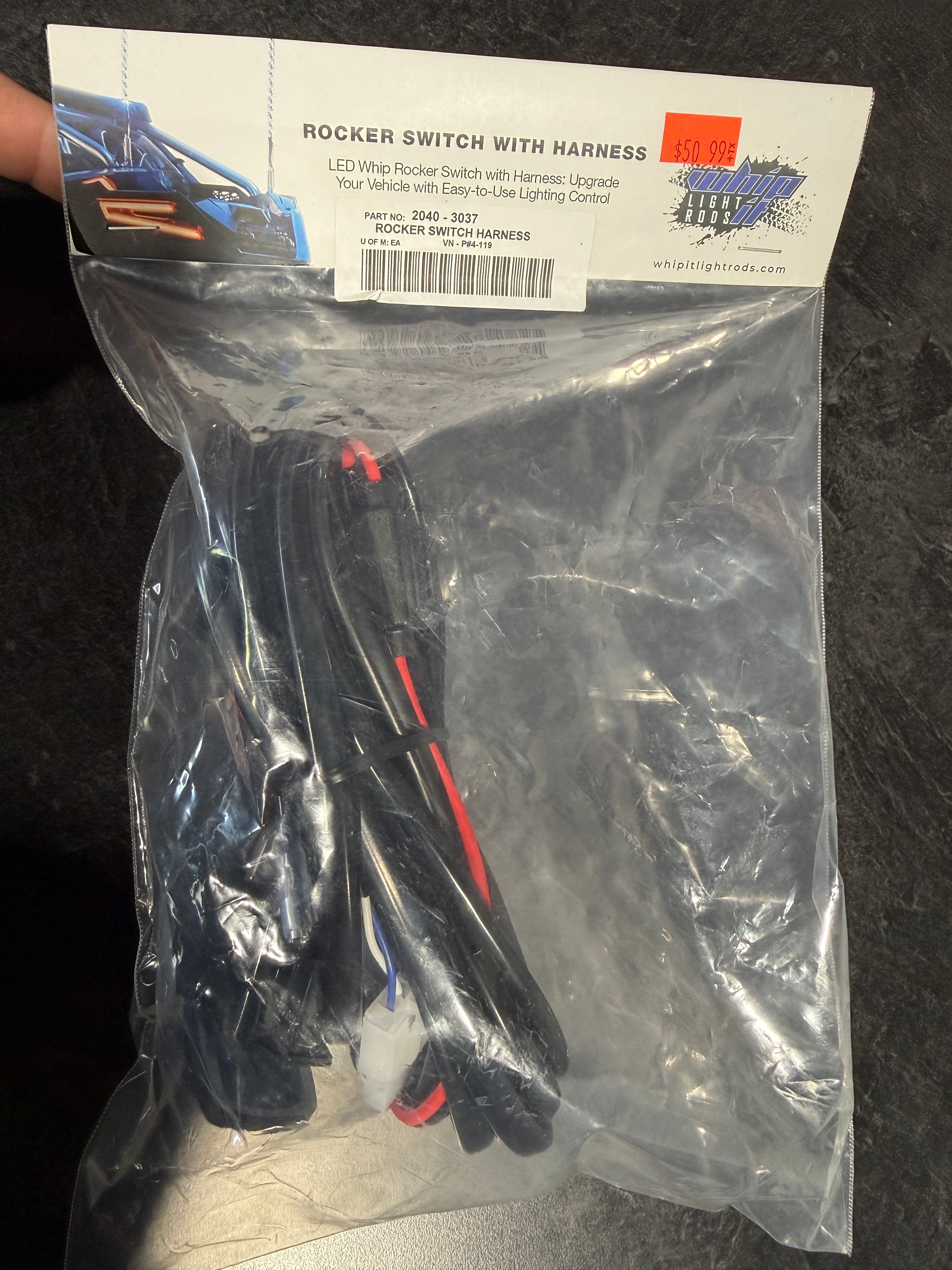 Rocker switch with harness